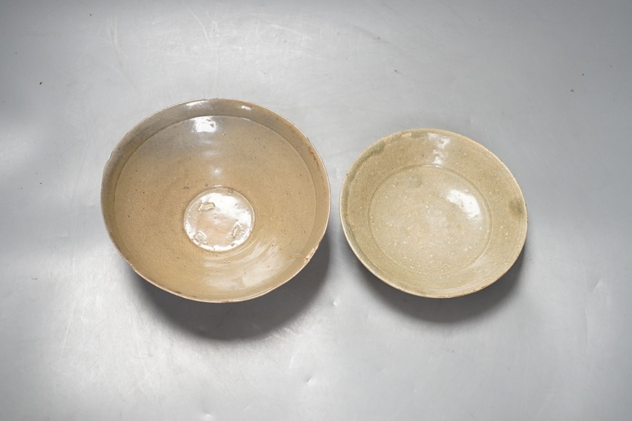 Two Korean celadon bowls or dishes, Goreyo dynasty., largest 17 cms diameter.